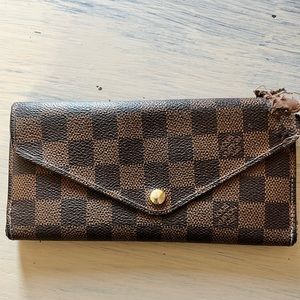 [eaten by a dog] Authentic Louis Vuitton flip wallet